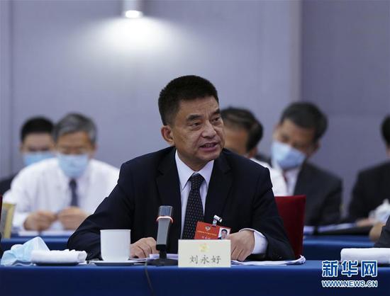  5月23日，全國政協(xié)委員劉永好在政協(xié)聯(lián)組會上發(fā)言。新華社記者 謝環(huán)馳 攝